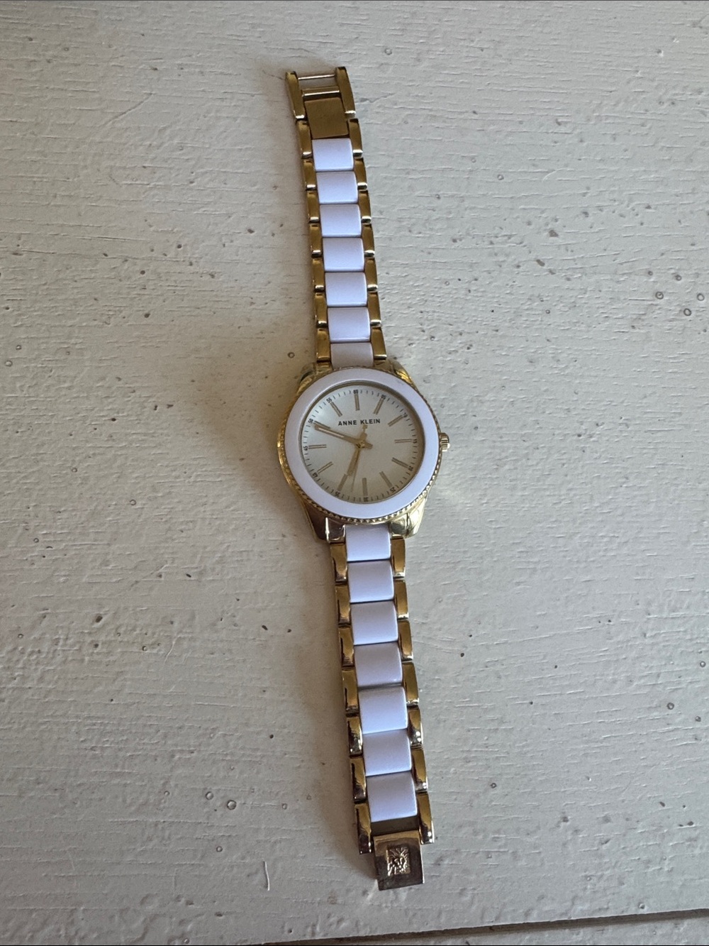 Anne Klein Gold and White Ceramic Link Bracelet Watch with Sunray Dial